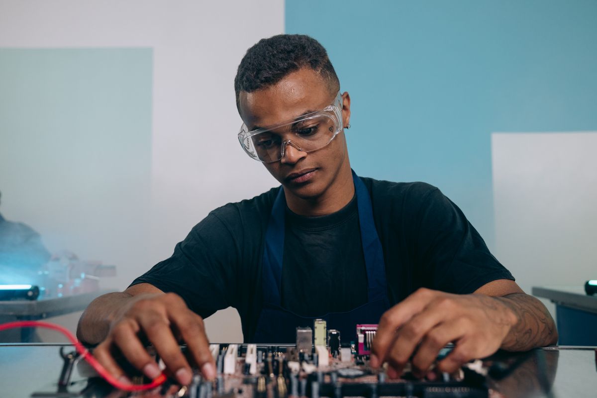 Electrical engineer working on a circuit board